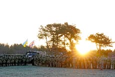 Ukrainian army trainees mark anniversary of Russian invasion at UK training camp