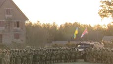 Ukrainian recruits in England conduct sunrise parade to mark anniversary of Russian invasion
