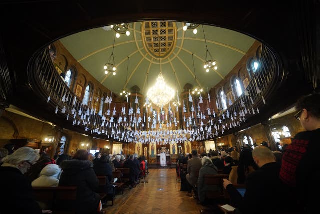 Some 461 paper angels, one for each child that has died in the past year according to the official statistics, hanging from the roof of the Ukrainian Catholic Cathedral in London (Yui Mok/PA)