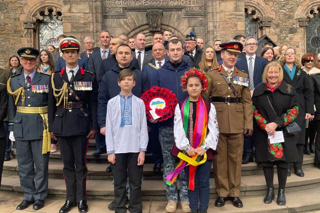 Ukrainian families, members of the armed forces, representatives from the UK and Scottish governments and consuls from countries across the globe gather at the Scottish National War Memorial at Edinburgh Castle on Friday to pay their respects to those fighting in Ukraine, one year on from the start of the conflict (Katharine Hay/PA)
