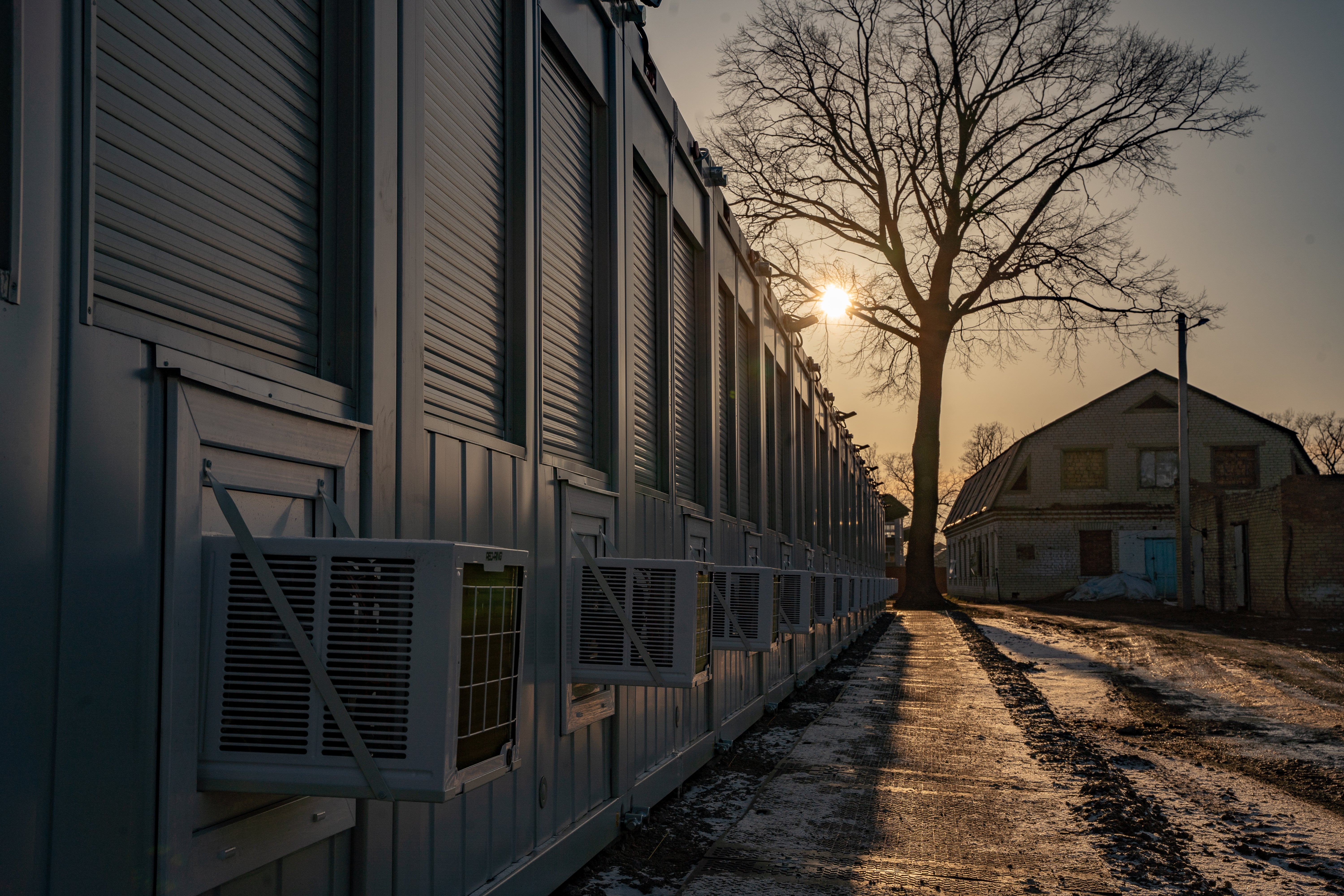 The pre-fabricated houses provided by Poland where Maria now lives