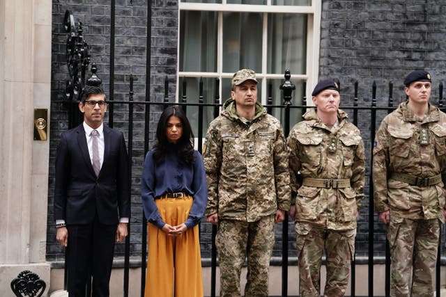 Prime Minister Rishi Sunak and his wife Akshata Murty with members of the Ukrainian Armed Forces, outside 10 Downing Street on Friday (Jordan Pettitt/PA)