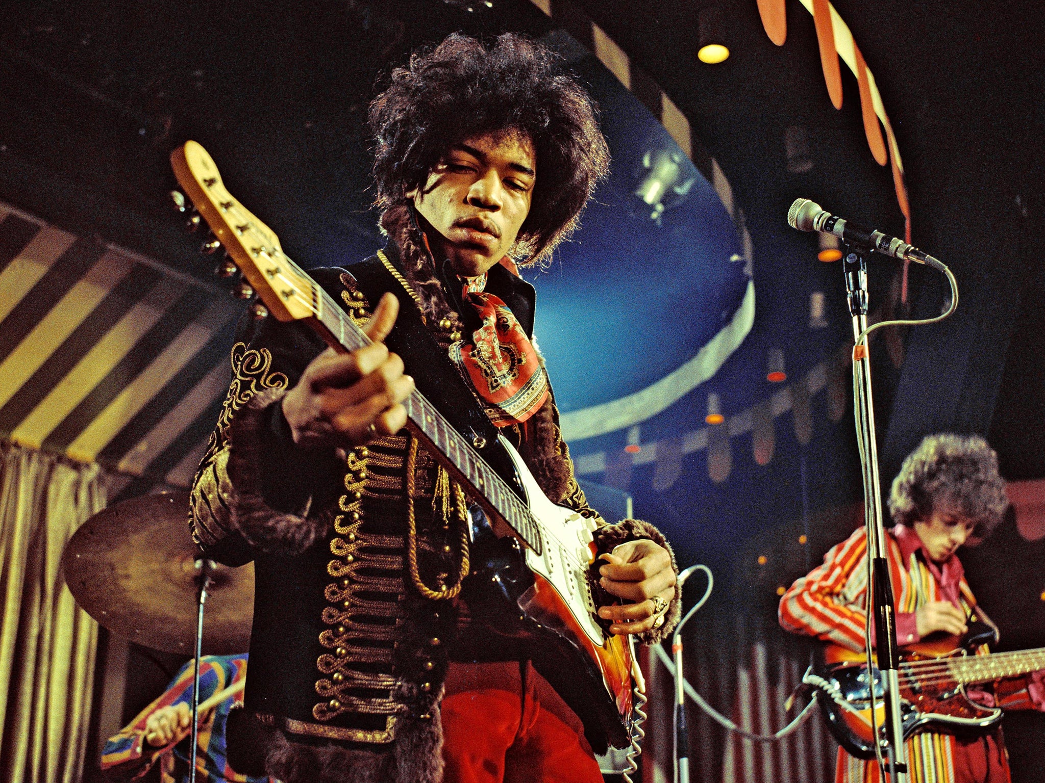 Jimi Hendrix (left) and Noel Redding play with The Jimi Hendrix Experience at the Marquee Club in London, 1967