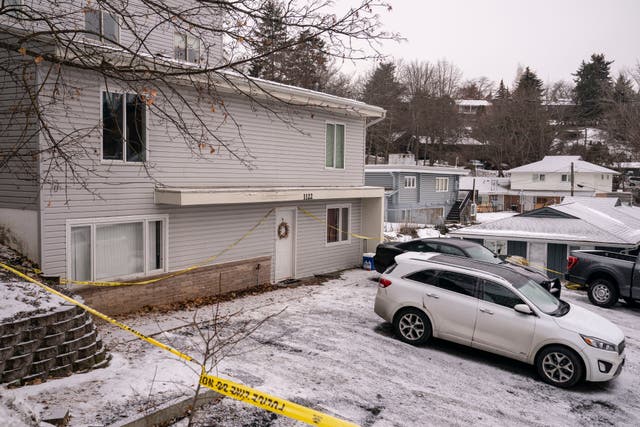 <p>Police tape surrounds a home that is the site of a quadruple murder on January 3, 2023 in Mosco</p>