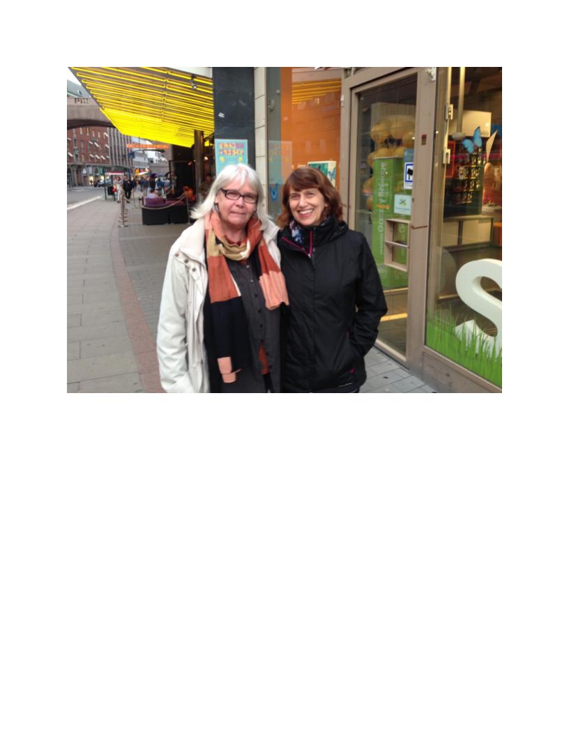 Kristin Enmark, left, poses with therapist Allan Wade’s partner, Cathy, in Sweden