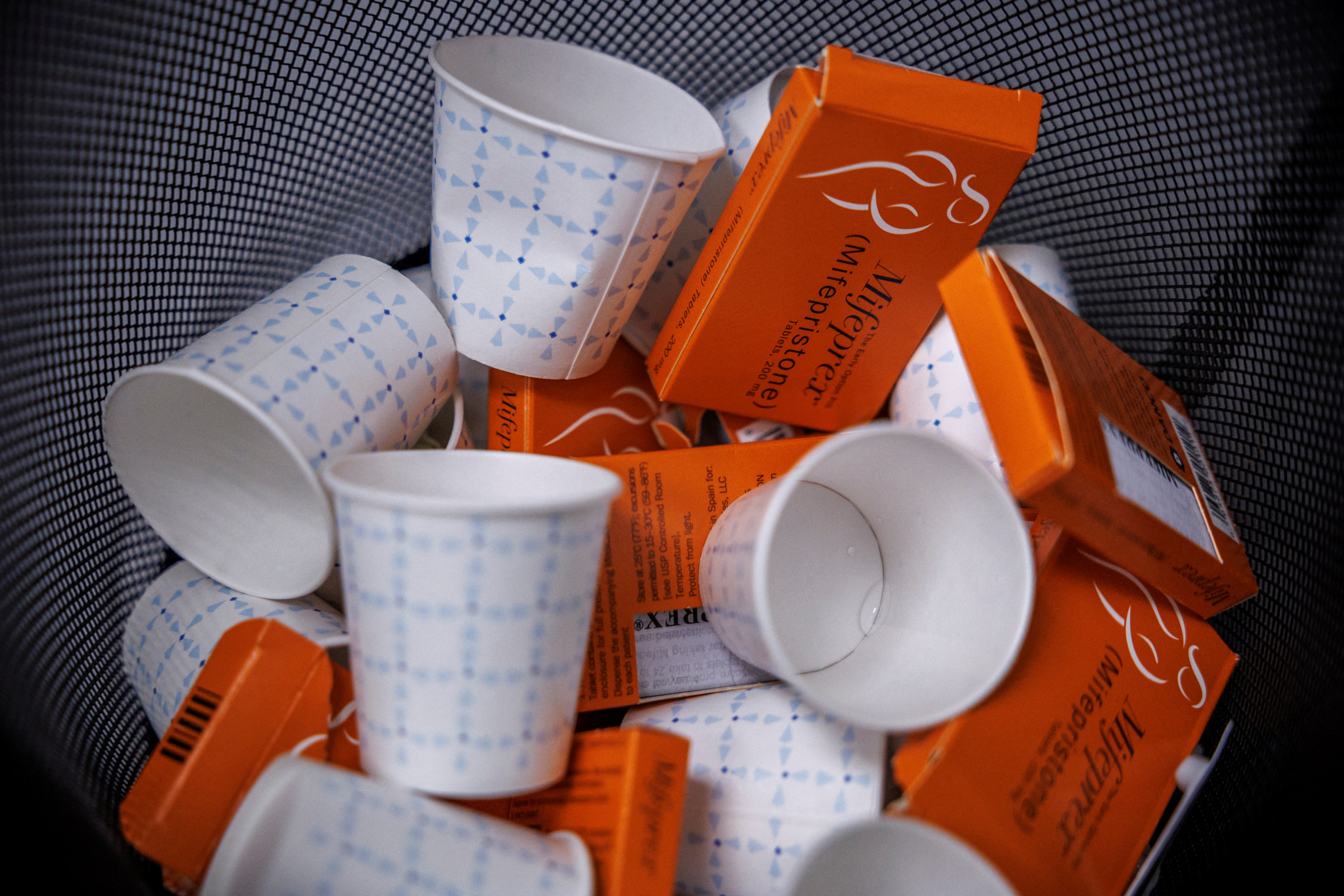 <p>Used boxes of mifepristone pills, the first drug used in a two-drug medical abortion protocol, fill a bin at Alamo Women’s Clinic in Albuquerque, New Mexico. </p>