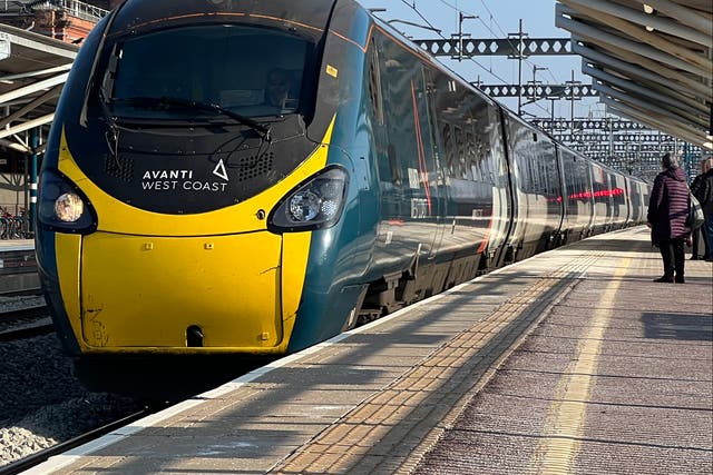 <p>Arriving soon? Avanti West Coast train at Rugby station on the West Coast main line in Warwickshire</p>