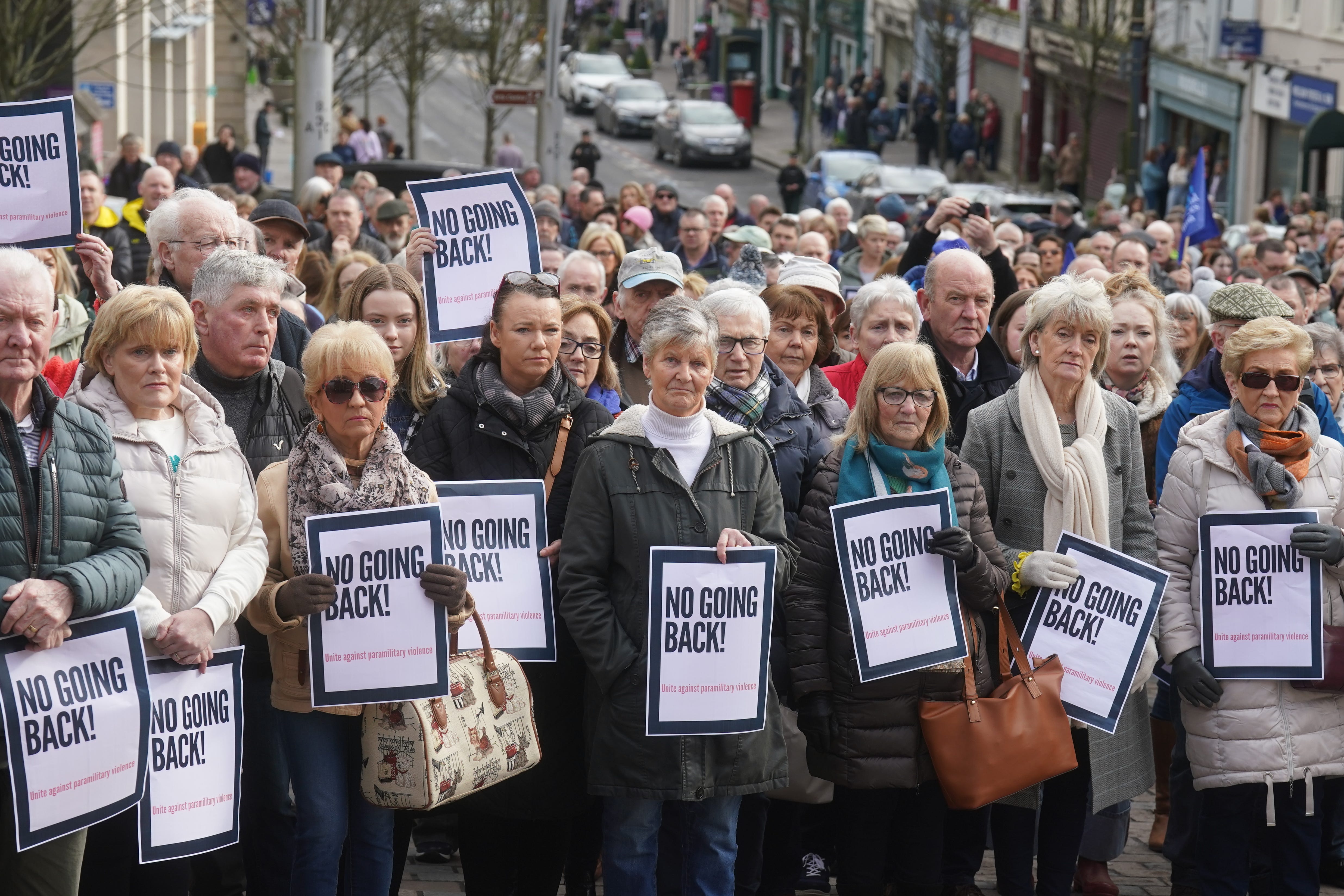 People taking part in a rally outside Omagh Courthouse to unite against paramilitary violence following the shooting of Detective Chief Inspector John Caldwell. (Brian Lawless/PA)