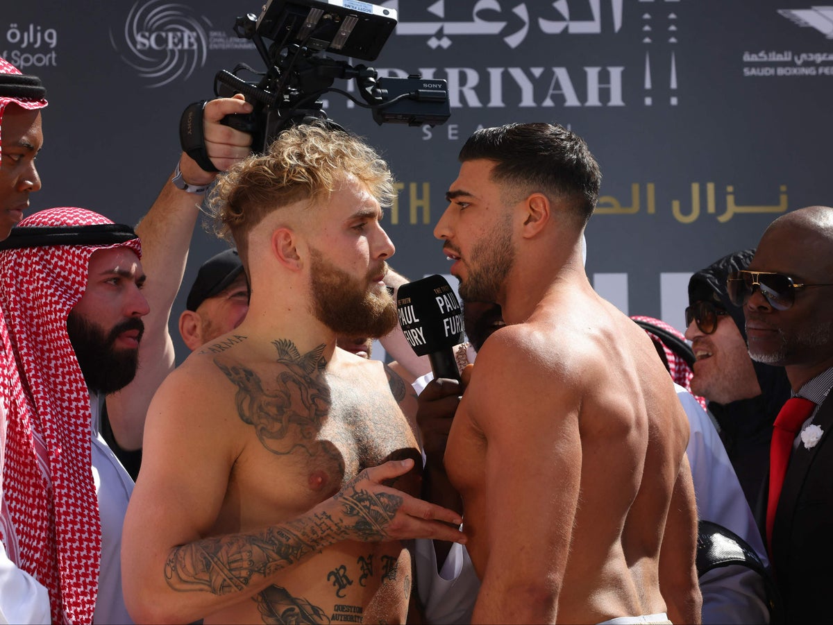 Tommy Fury and Jake Paul forced apart as pre-fight weigh-in gets heated