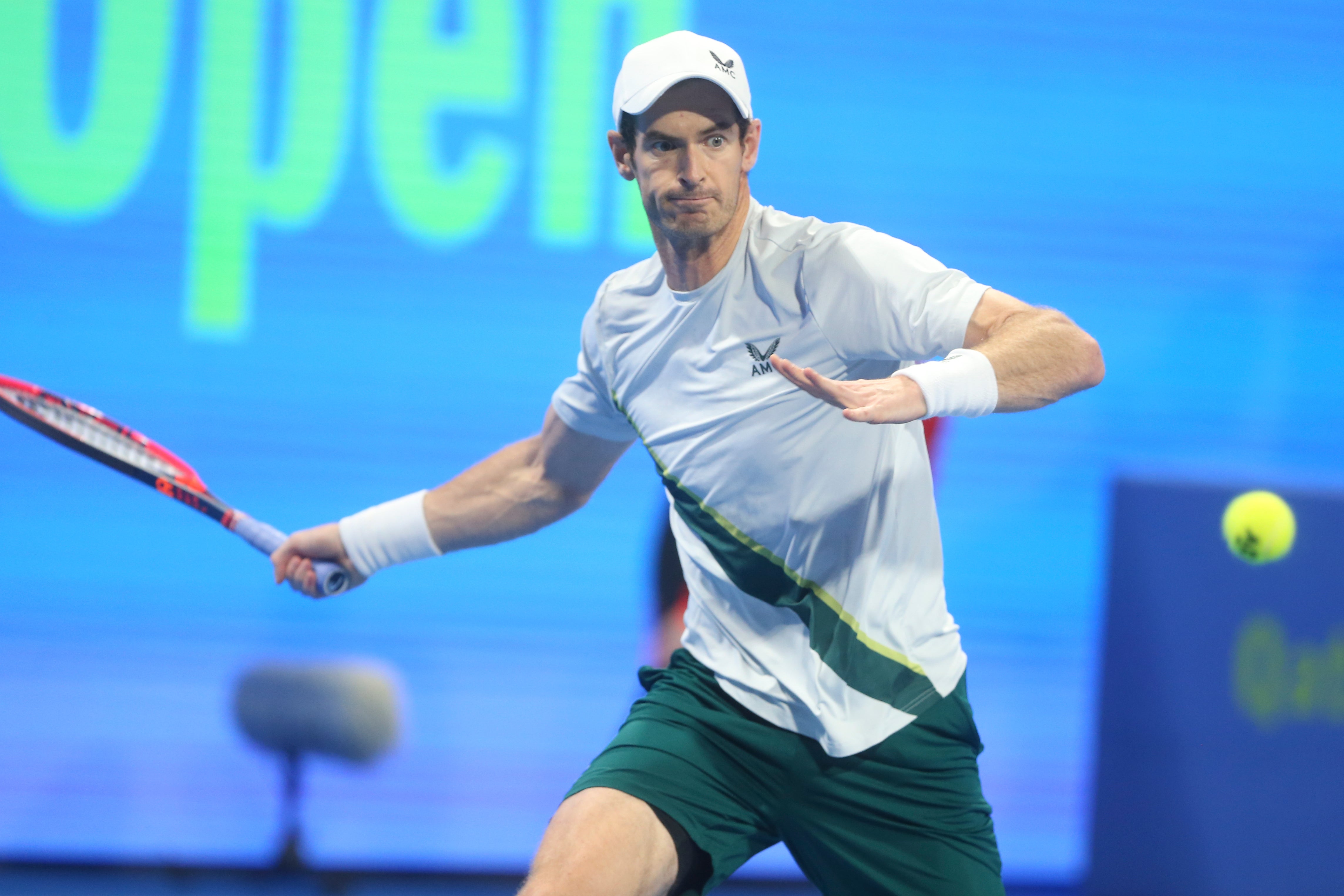 Andy Murray of Great Britain returns to Daniel Medvedev