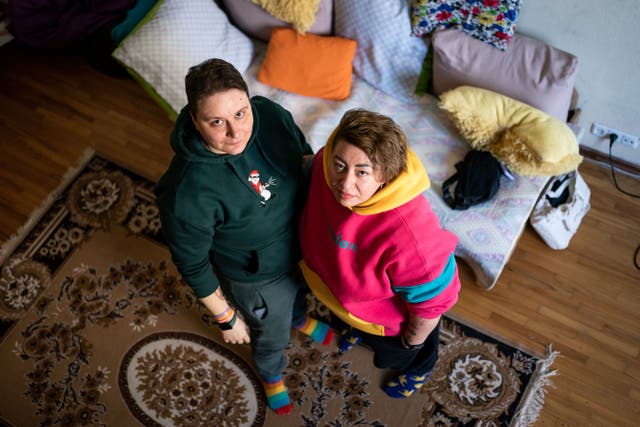 Jul Sirous and Olha Onipko in the KyivPride shelter (Aaron Chown/PA)