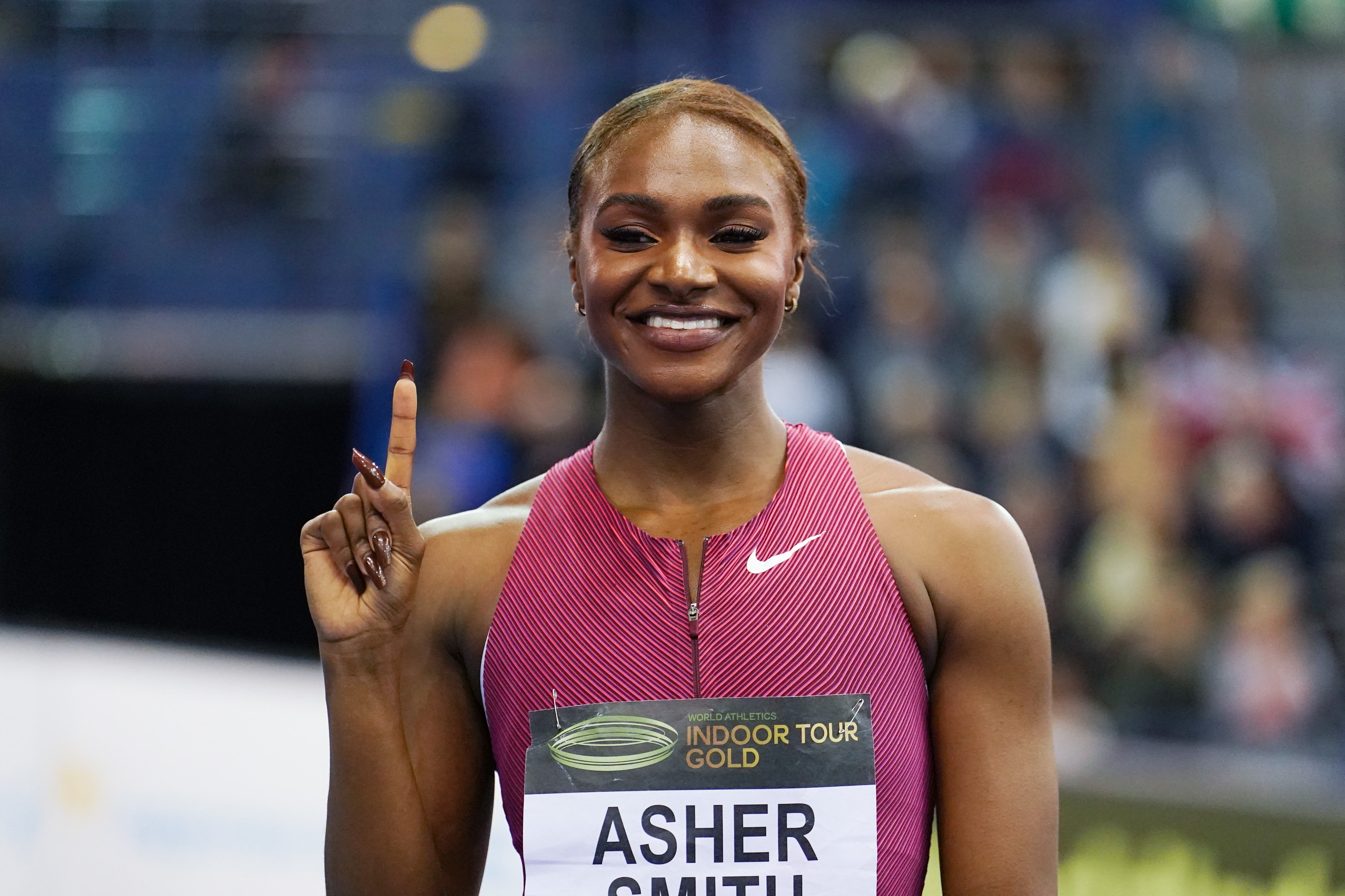 Dina Asher-Smith celebrates winning the women’s 60m (Martin Rickett/PA).