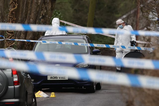 <p>Forensic officers from Police Service of Northern Ireland (PSNI) at the sports complex in the Killyclogher Road area of Omagh, Co Tyrone, where off-duty PSNI Detective Chief Inspector John Caldwell was shot a number of times by masked men in front of young people he had been coaching. Mr Caldwell remains in a critical but stable condition in hospital following the attack on Wednesday evening. Picture date: Thursday February 23, 2023.</p>