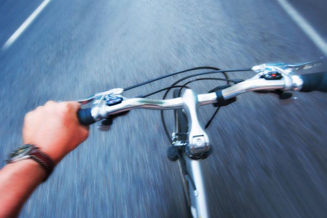 Almost two-thirds (65%) of drivers believe aggressive cyclists are a threat to their safety, a new survey suggests (Tetra Images/Alamy Stock Photo/PA)