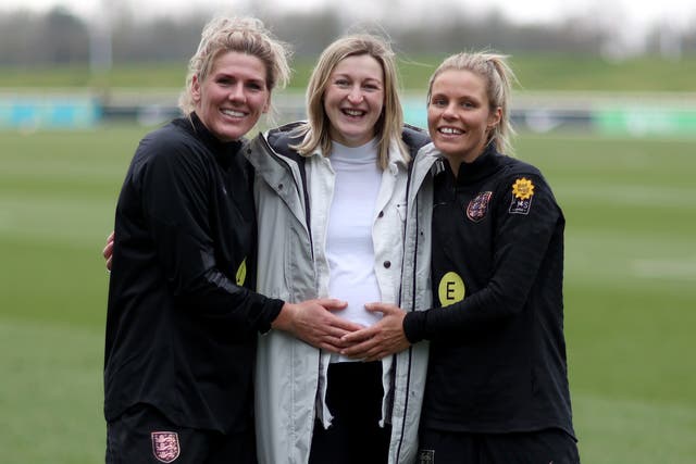 <p> Ellen White, Rachel Daly and Millie Bright of England pose for a photograph at St George's Park on February 15, 2023</p>