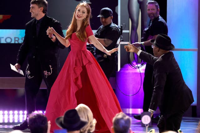 <p>Jessica Chastain receives help from Paul Mescal (left) and Courtney B Vance after tripping while walking onstage to accept her SAG Award</p>
