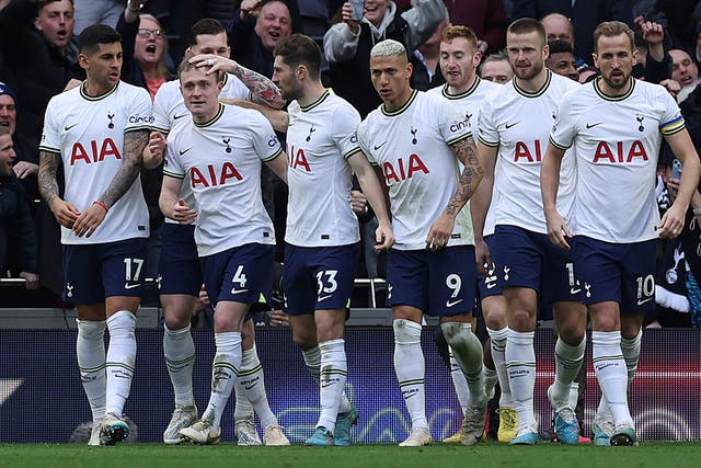 Tottenham players celebrate with Oliver Skipp after his goal against Chelsea (Ian Walton/AP/PA)