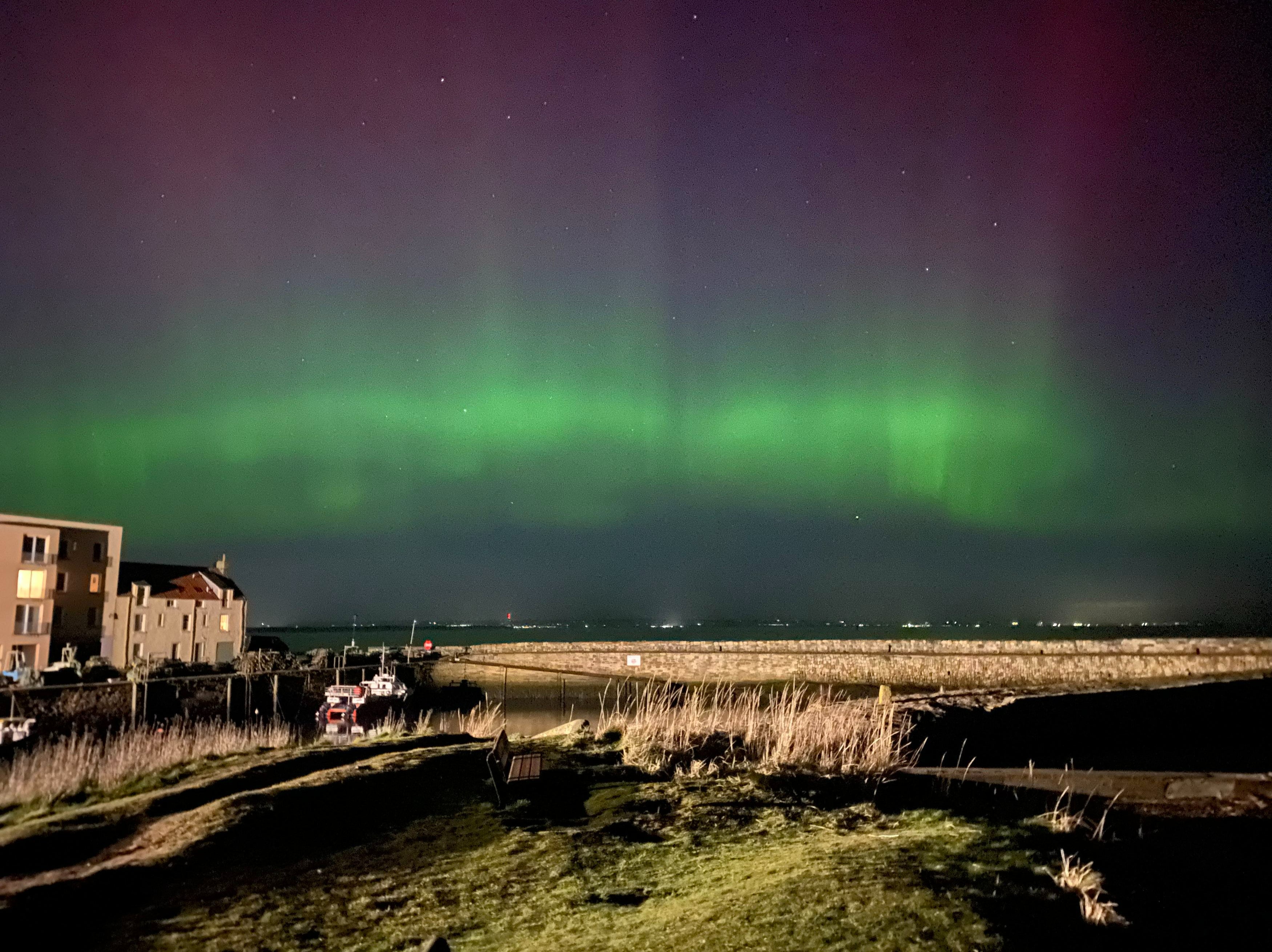 Aurora stretching across the night sky in St Andrews