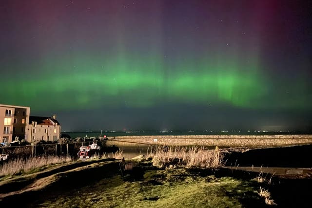 <p>Aurora stretching across the night sky in St Andrews</p>
