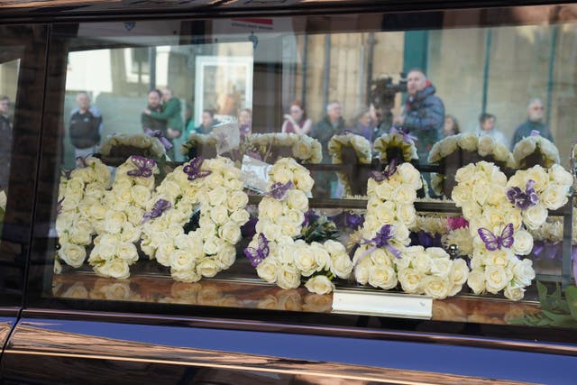 A floral tribute for the funeral of Holly Newton at Hexham Abbey in Hexham (Owen Humphreys/PA)
