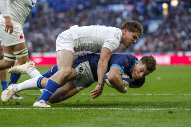 Huw Jones scored two tries in Paris (Ben Whitley/PA)