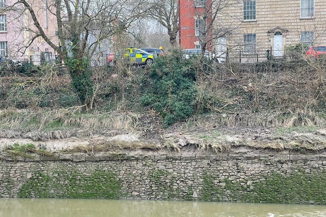 <p>The scene in the Bedminster area of Bristol after a car went through railings and into the River Avon</p>