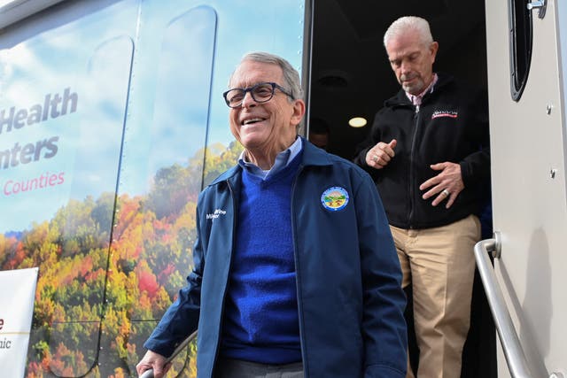 <p>Ohio Governor Mike DeWine exits a newly opened mobile clinic following the derailment of a train carrying toxic chemicals which caused a fire that sent a cloud of smoke over the town of East Palestine, Ohio, U.S., February 21, 2023</p>