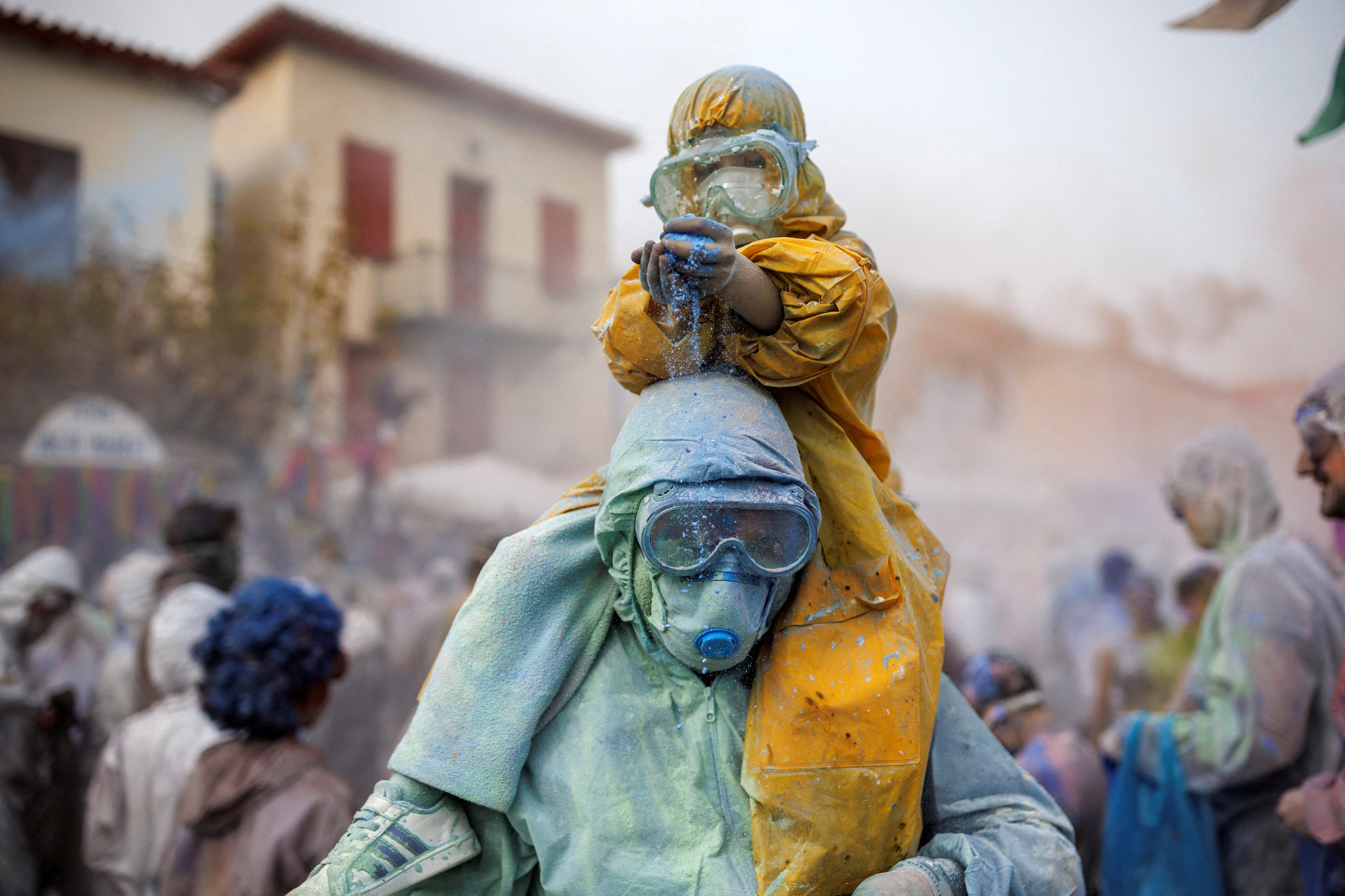 Revellers celebrate “Ash Monday” by participating in a colourful “flour war”, a traditional festivity marking the end of the carnival season and the start of the 40-day Lent period until the Orthodox Easter, in the port town of Galaxidi, Greece