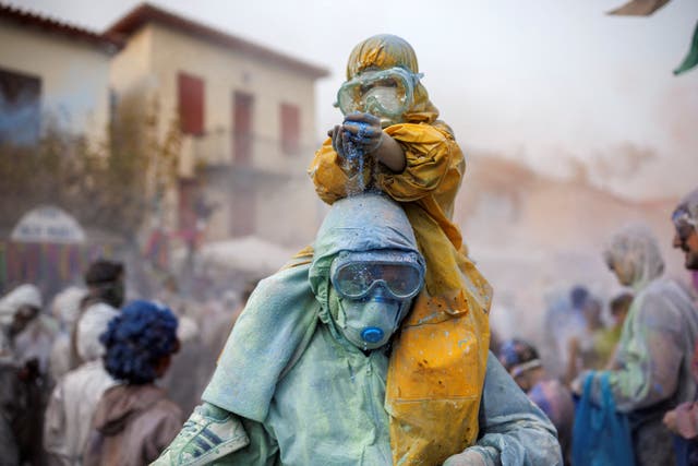 <p>Revellers celebrate “Ash Monday” by participating in a colourful “flour war”, a traditional festivity marking the end of the carnival season and the start of the 40-day Lent period until the Orthodox Easter, in the port town of Galaxidi, Greece</p>
