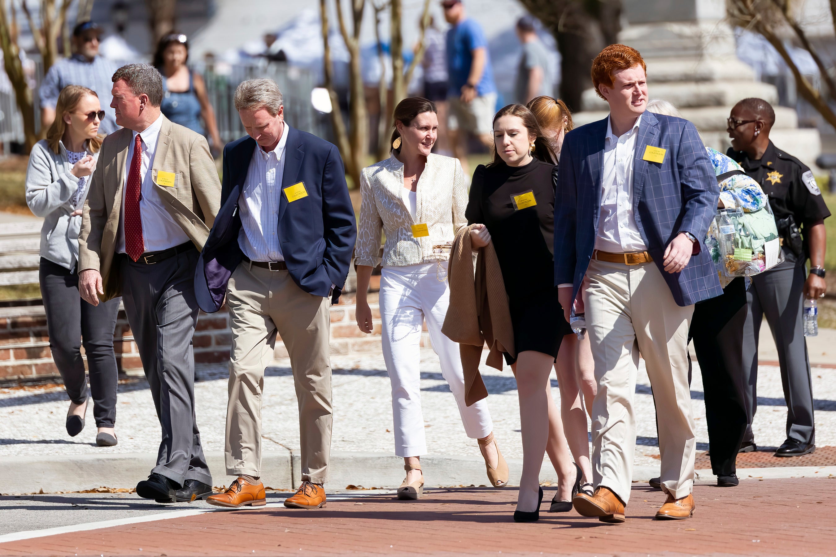 From left, Randy Murdaugh; John Marvin Murdaugh; his wife, Liz Murdaugh; Brooklynn White; and Buster Murdaugh, the son of Alex Murdaugh, leave the courthouse during Alex Murdaugh’s trial