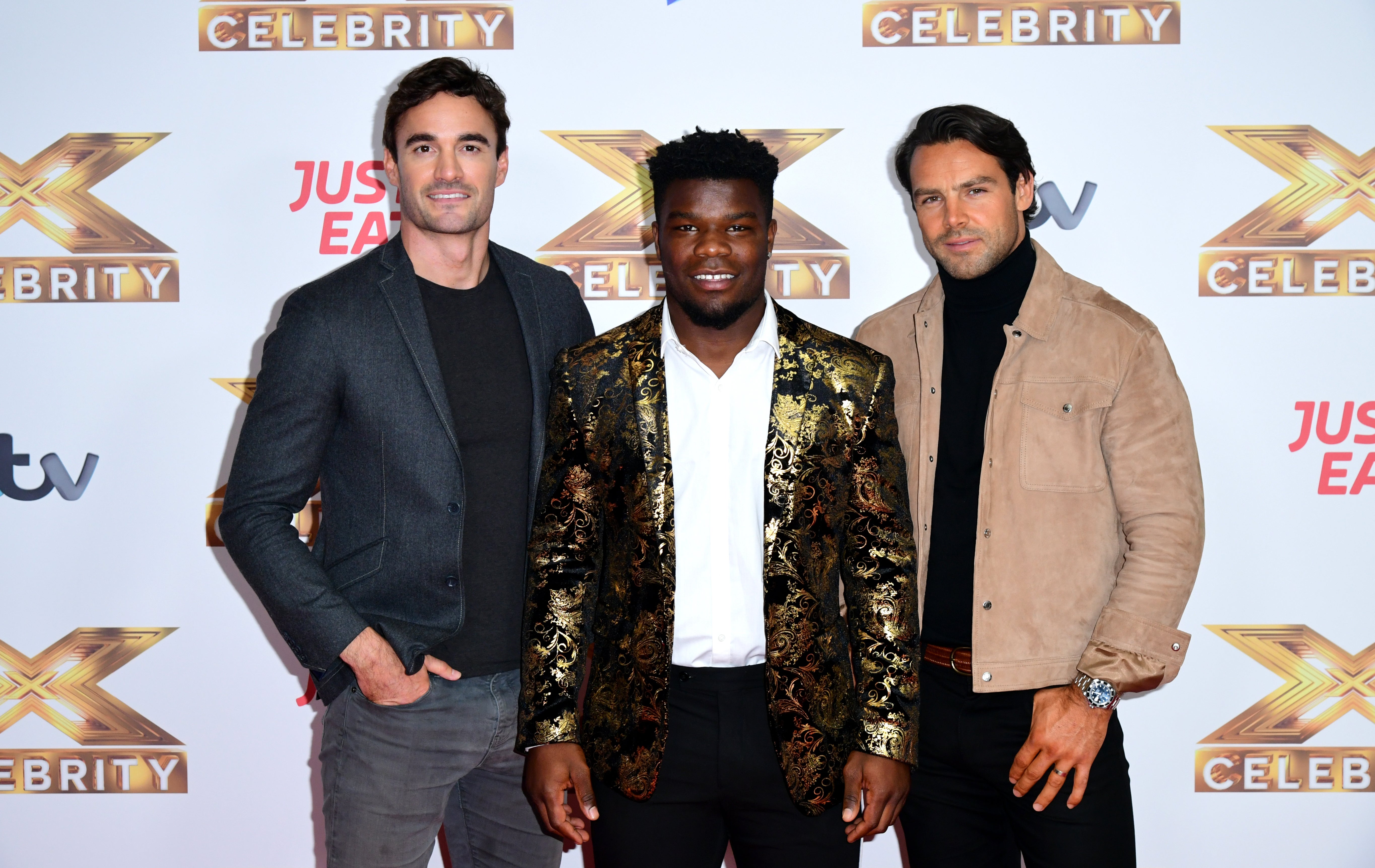 Mr Davis (centre) signed a record deal after appearing on Celebrity X Factor in 2019