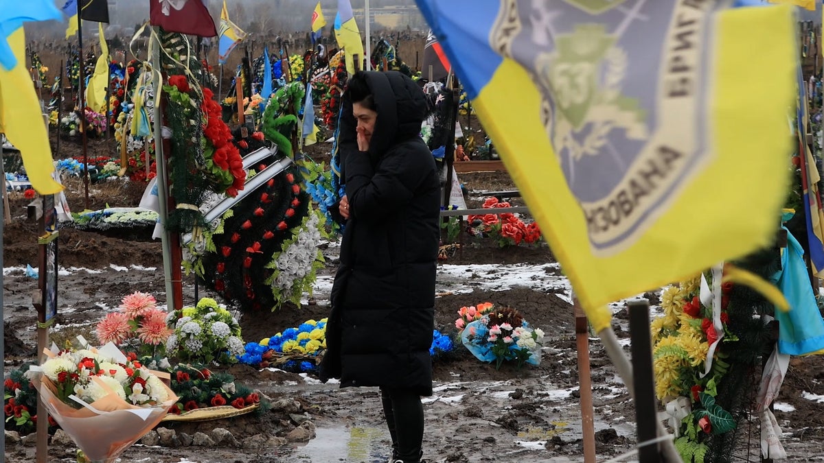 Ukrainian flags fly at military cemetery in Dnipro honouring fallen soldiers