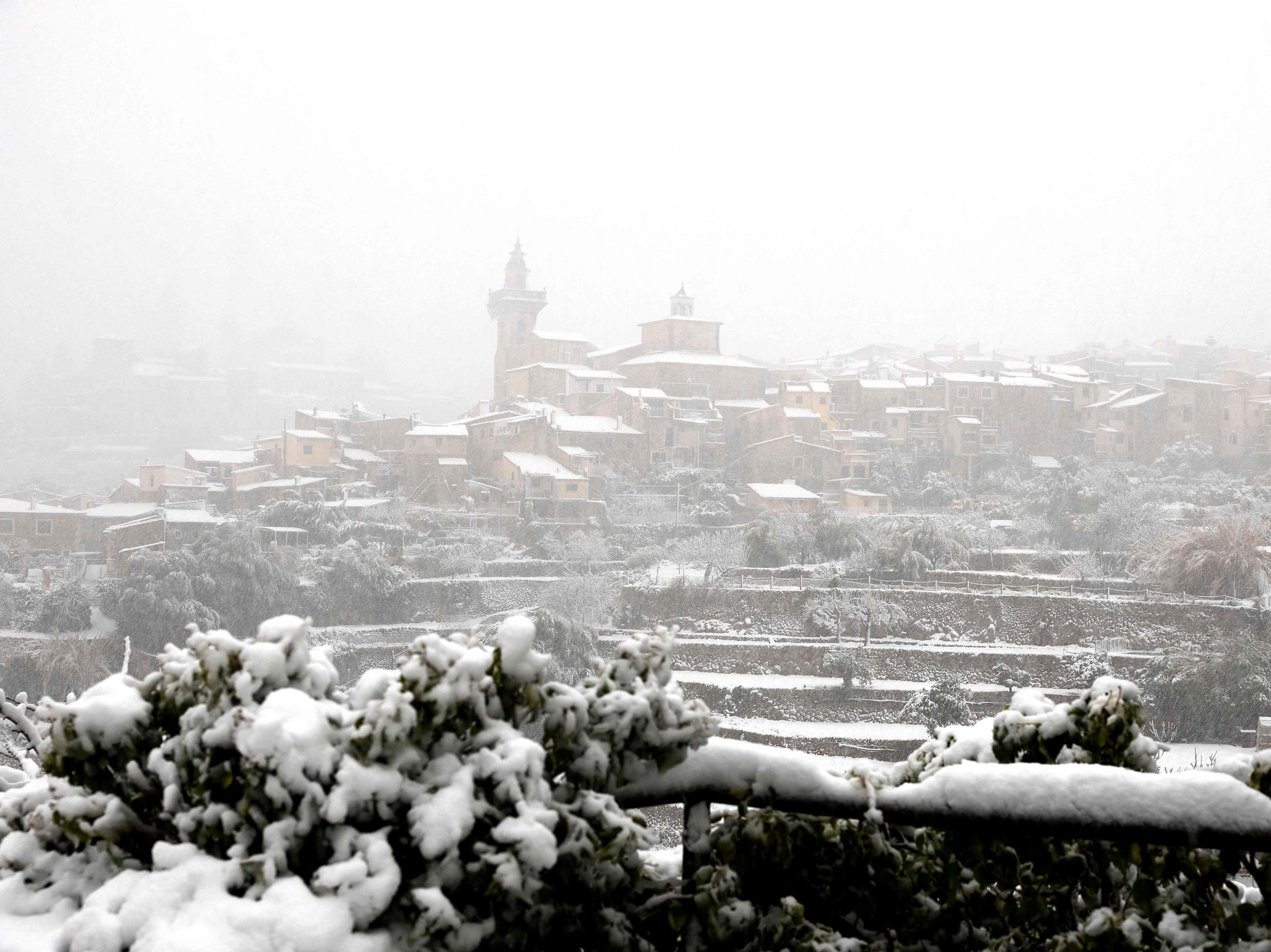 The mountain village of Valldemossa covered in snow, on the Spanish Balearic island of Mallorca