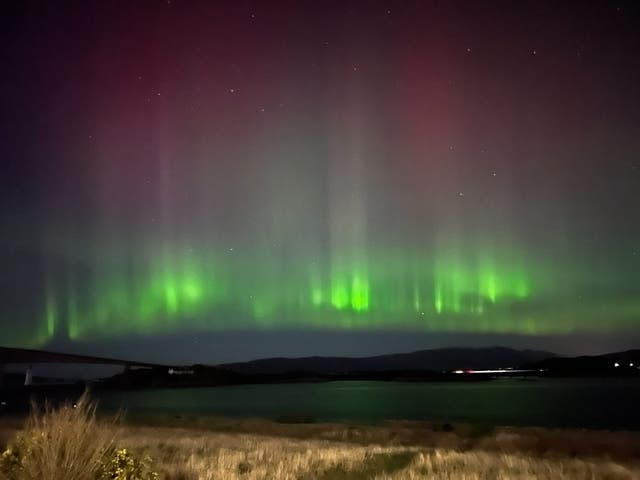 <p>The Northern Lights shining over Kyleakin on the Isle of Skye</p>