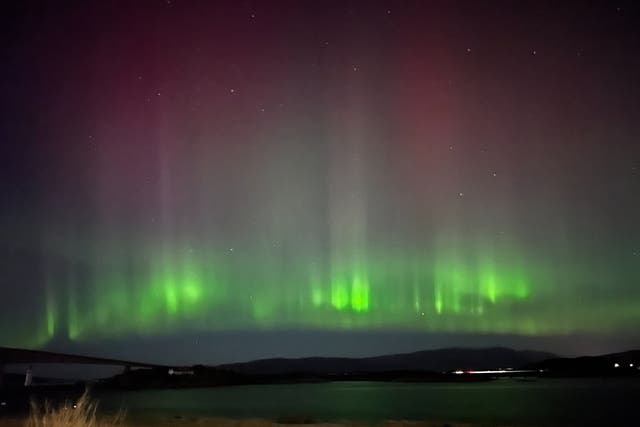 <p>The Northern Lights shining over Kyleakin on the Isle of Skye</p>