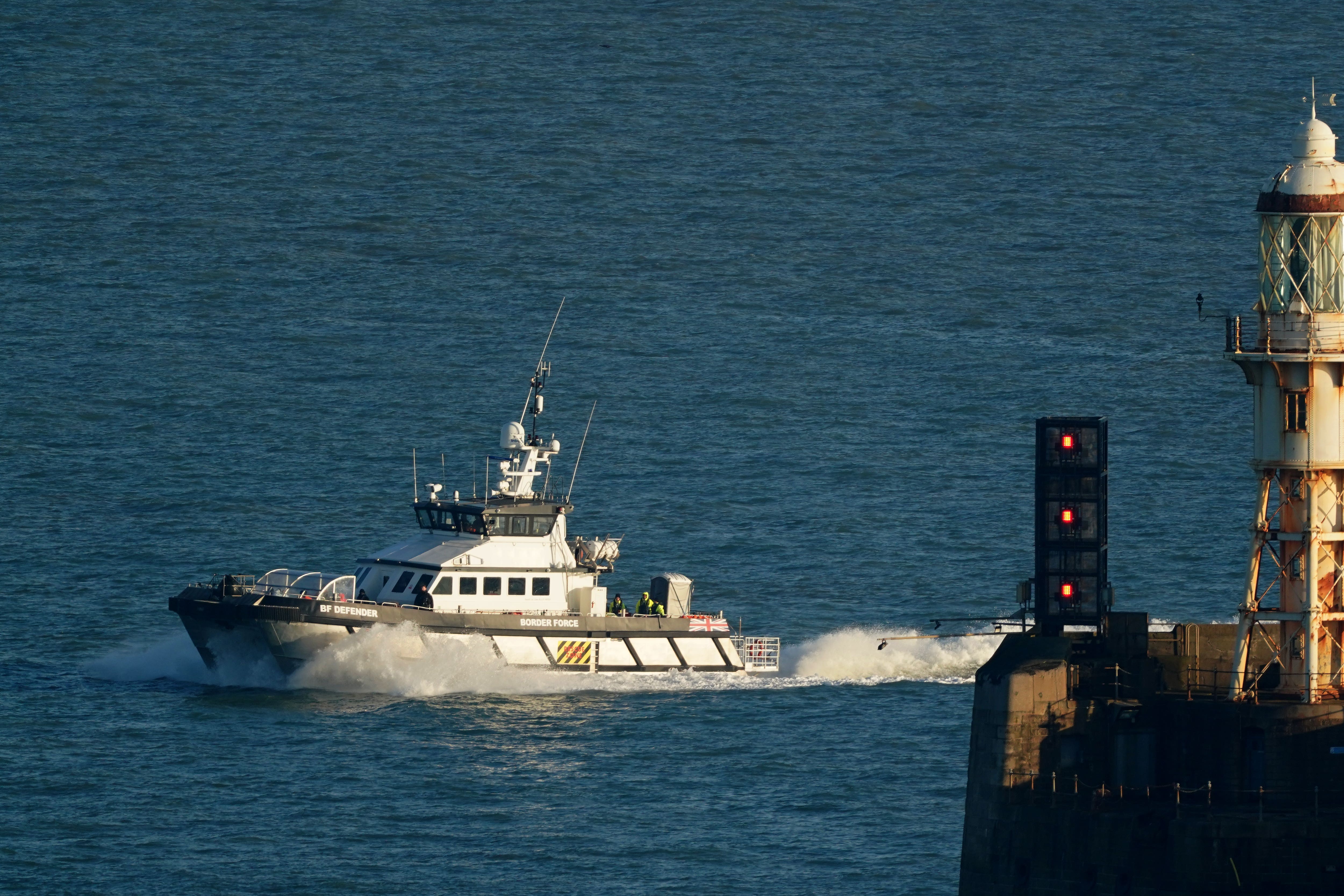 A group of people thought to be migrants are brought in to Dover, Kent, onboard a Border Force vessel, following a small boat incident in the Channel. Picture date: Tuesday February 7, 2023.