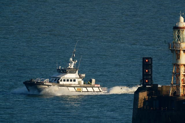 A group of people thought to be migrants are brought in to Dover, Kent, onboard a Border Force vessel, following a small boat incident in the Channel. Picture date: Tuesday February 7, 2023.