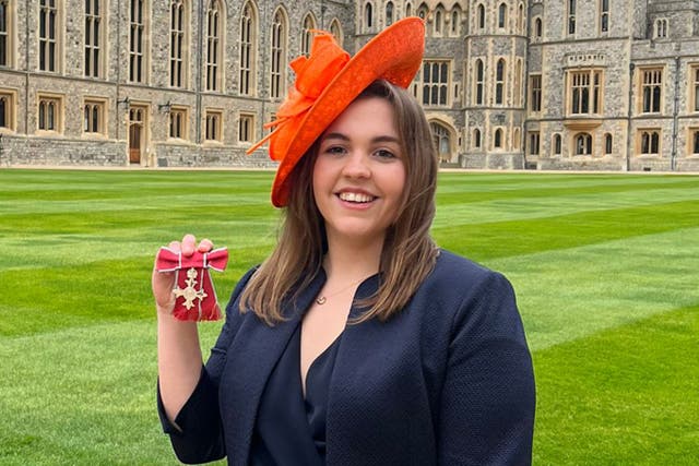 Charlotte Nichols after being made an MBE by the Princess Royal at Windsor Castle (University of Bristol/PA)