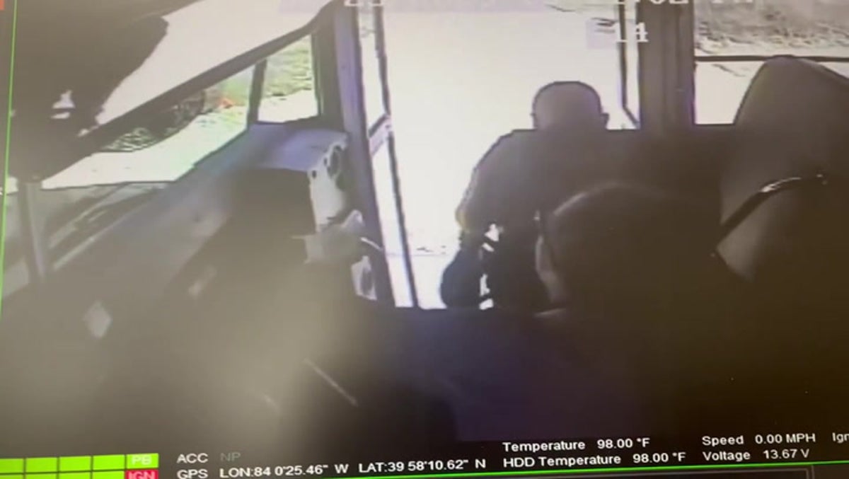 Moment bus driver pulls boy from path of potential car crash