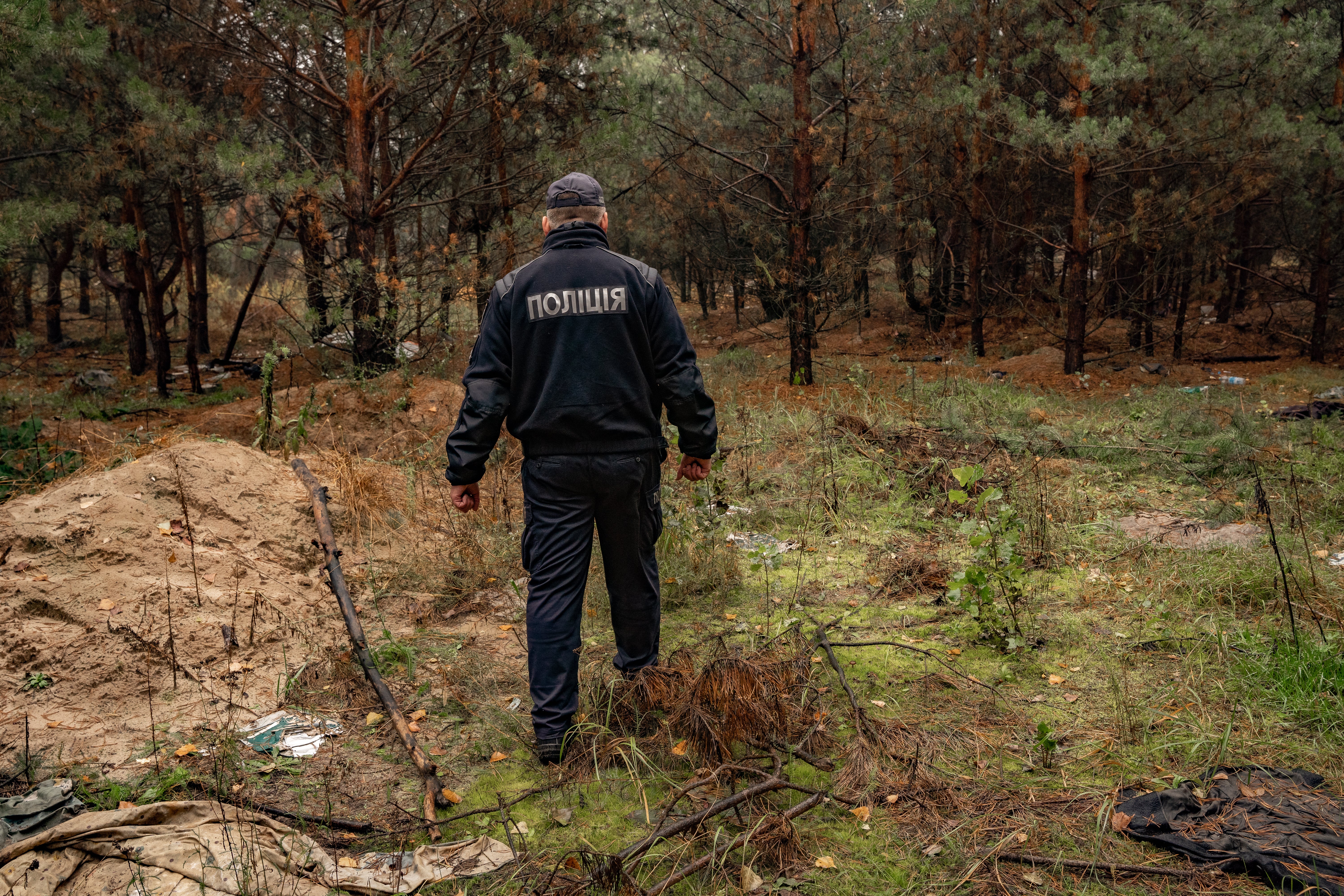 Ukrainian police investigate the area