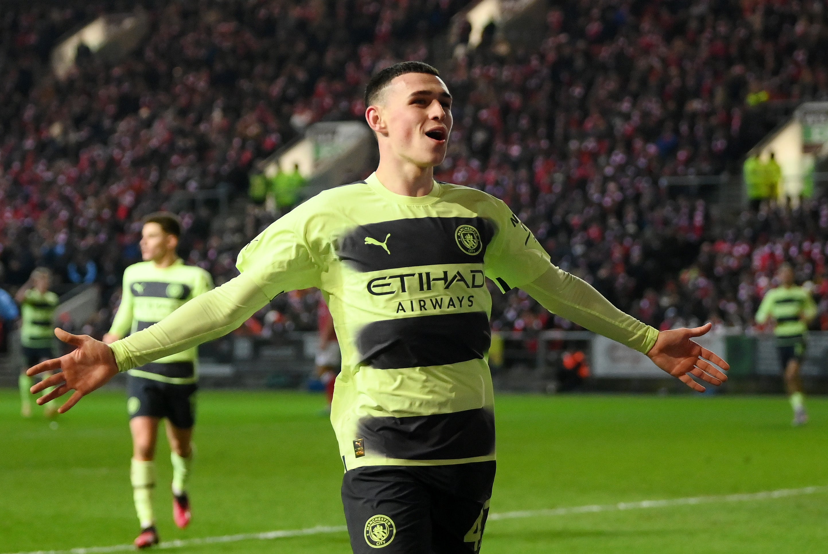 Phil Foden celebrates scoring the second goal for City