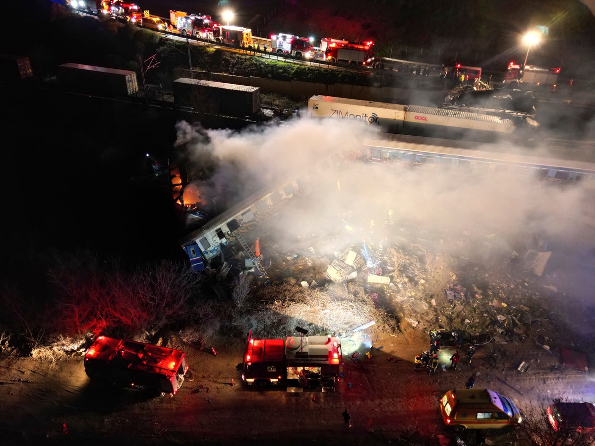 At least 26 dead and scores injured in head-on collision between two trains in central Greece