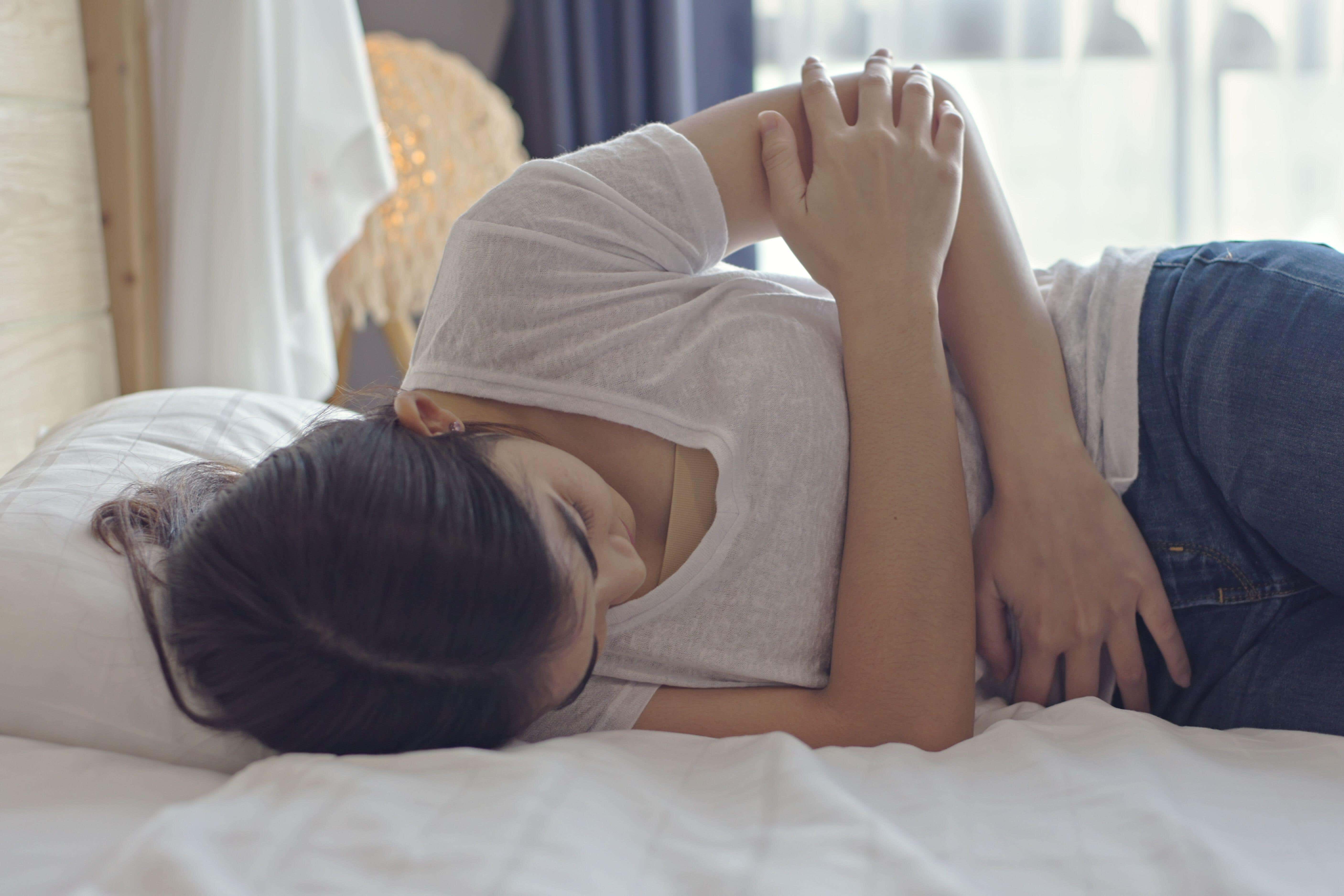 Endometriosis symptoms can include pelvic discomfort and painful periods (Alamy/PA)