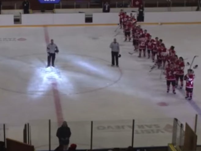 Players of Hong Kong’s ice hockey team make a time-out gesture as the protest song ‘Glory to Hong Kong’ was played after their win against Iran, instead of the Chinese national anthem. Screengrab