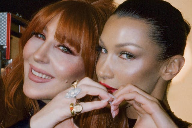 <p>Charlotte Tilbury and Bella Hadid pose together as they announce their new partnership</p>