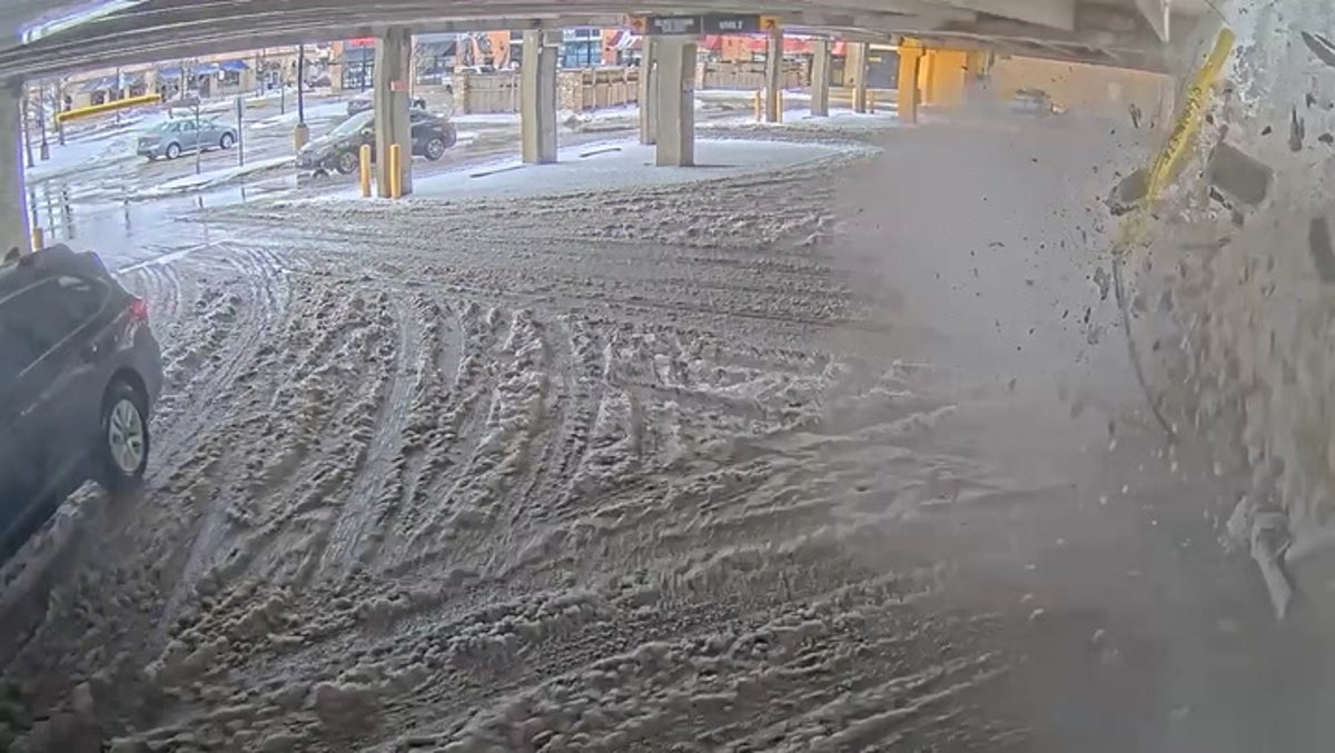 Moment shopping centre car park collapses, narrowly missing vehicle