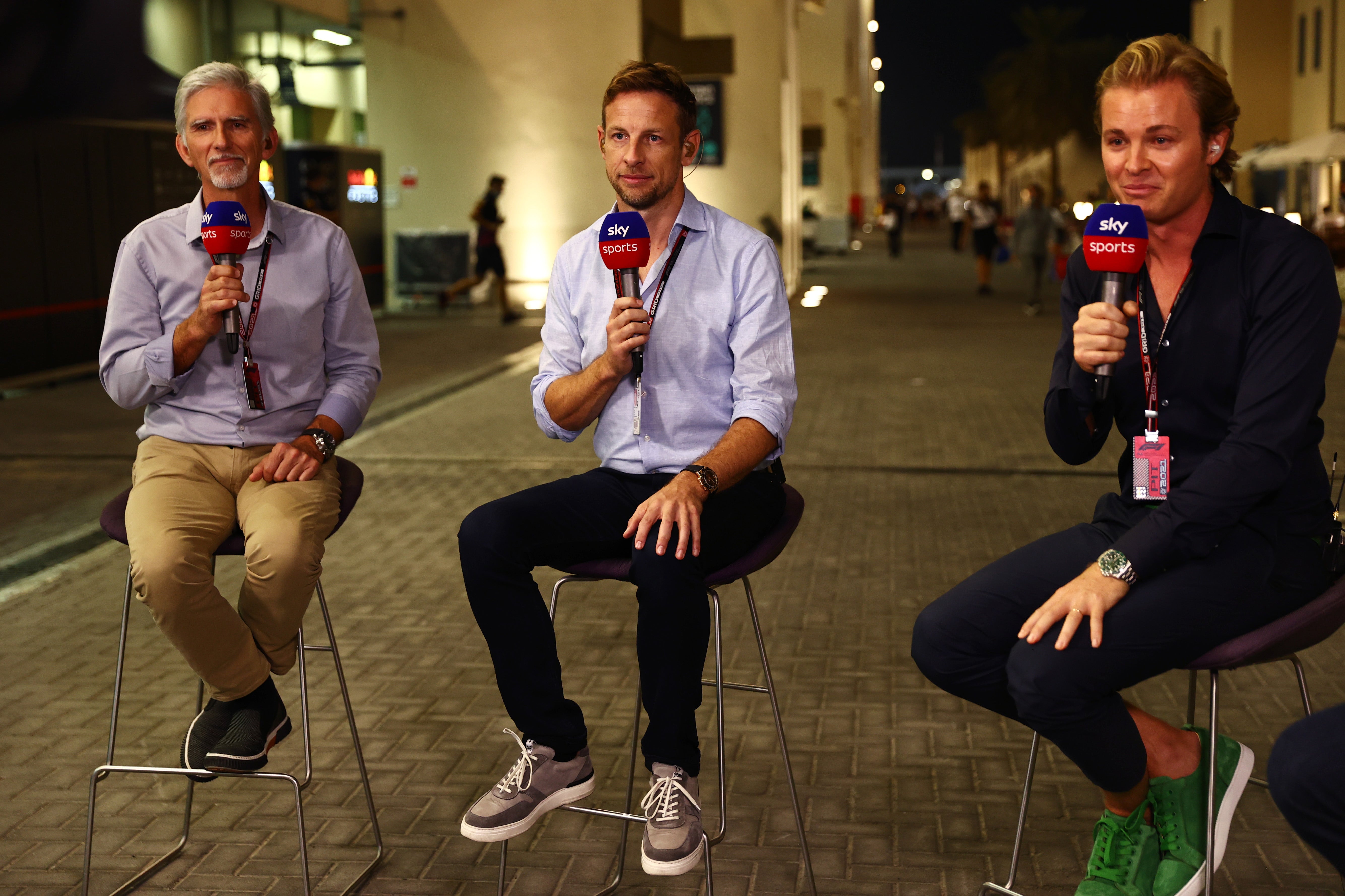 The 2009 world champion (centre) now works for Sky Sports as a pundit and co-commentator