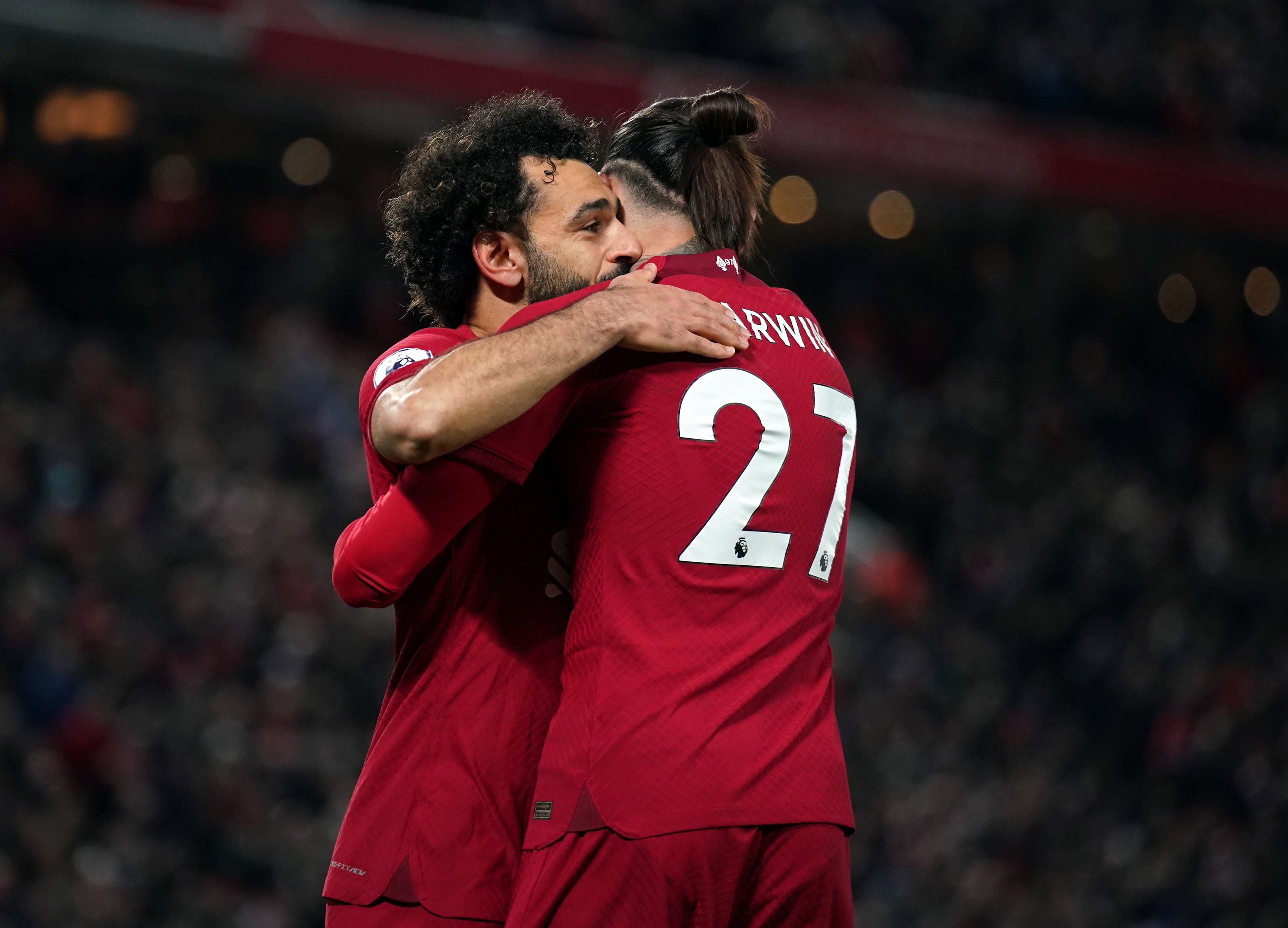 Liverpool’s Mohamed Salah celebrates scoring with Darwin Nunez