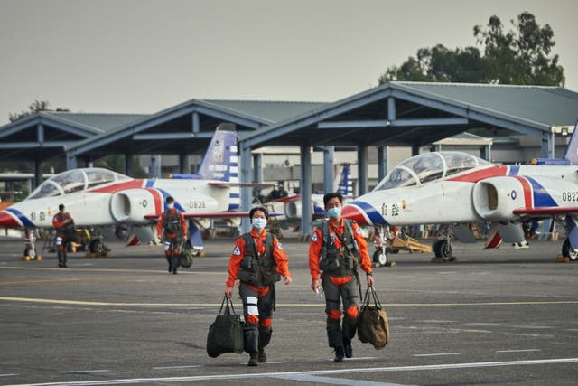 <p>AT3 jet pilots return after running missions and trainings at a base in Kaohsiung</p>
