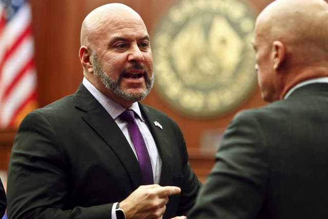 <p>Sen. Blaise Ingoglia, R-Spring Hill, speaks to a colleague on the Senate floor at the Capitol, Monday, Feb. 6, 2023, in Tallahassee, Fla. Florida legislators are meeting in a two-week special session to take up a list of issues proposed by Gov. Ron DeSantis. (AP Photo/Phil Sears)</p>